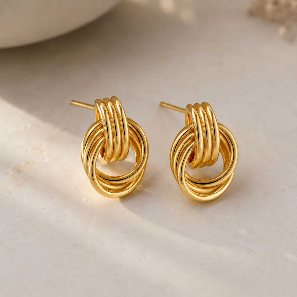 Elara Gold Twist Earrings
