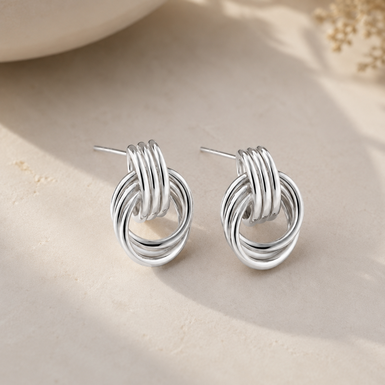 Éclat Silver Twist Earrings