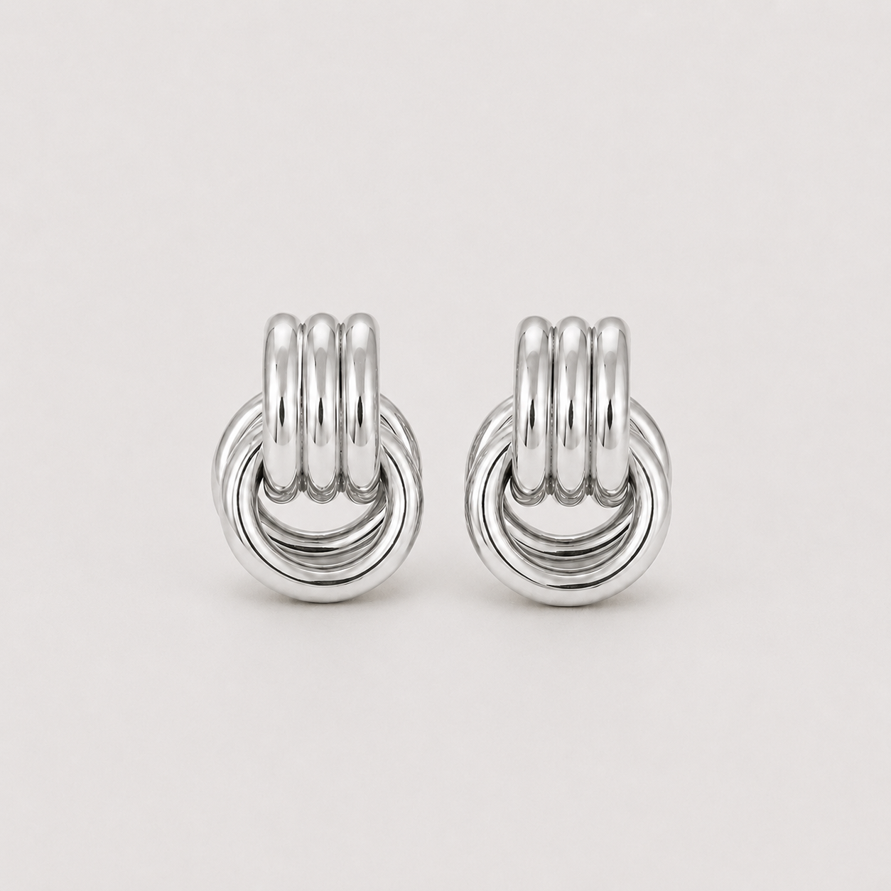Éclat Silver Twist Earrings