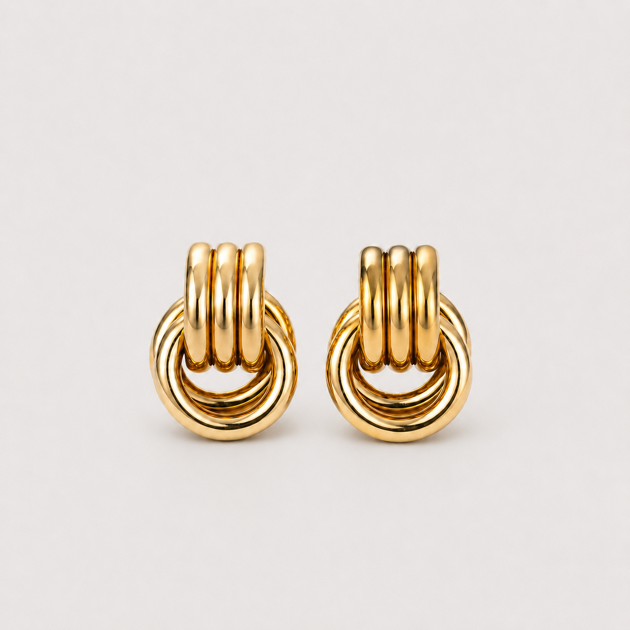 Elara Gold Twist Earrings