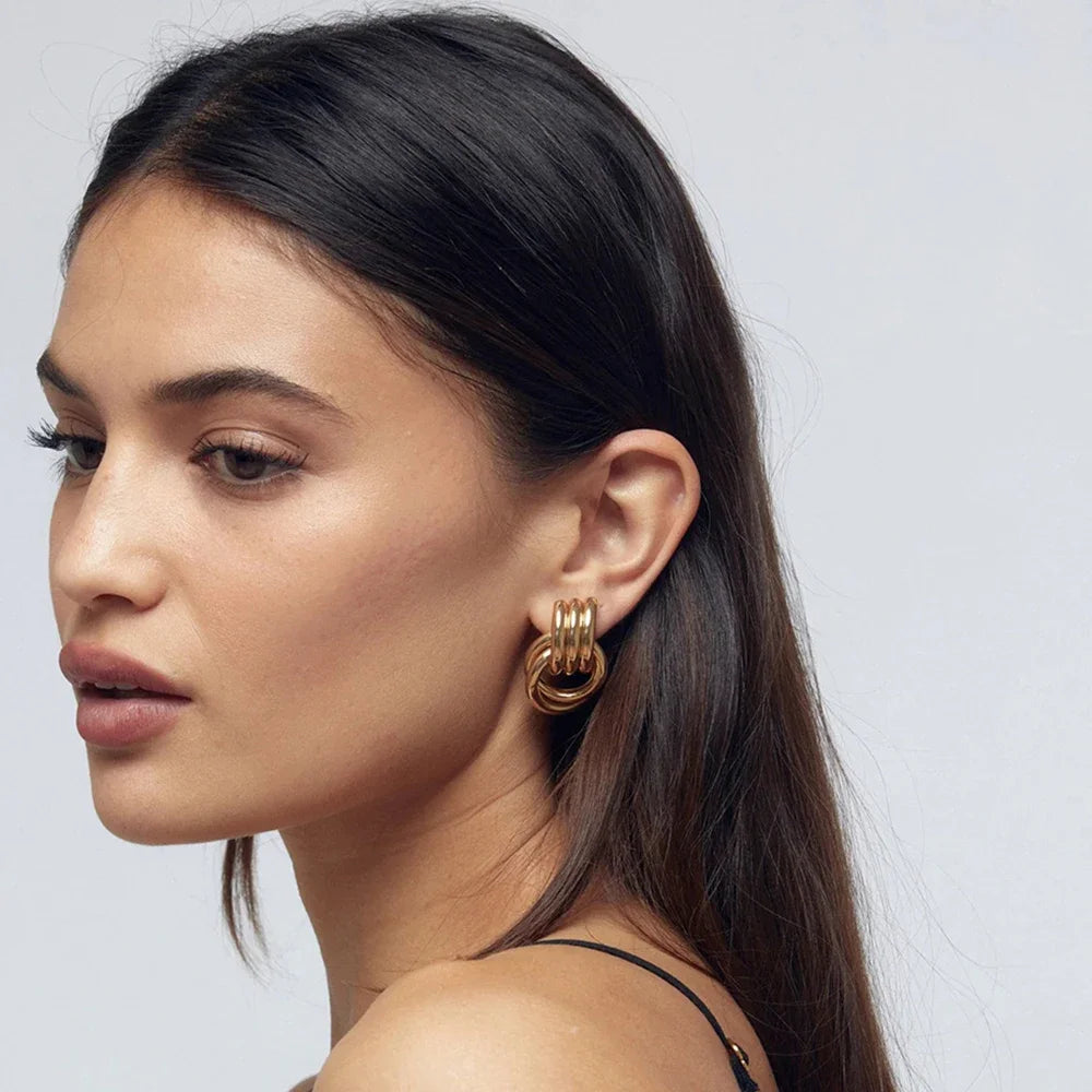 Elara Gold Twist Earrings