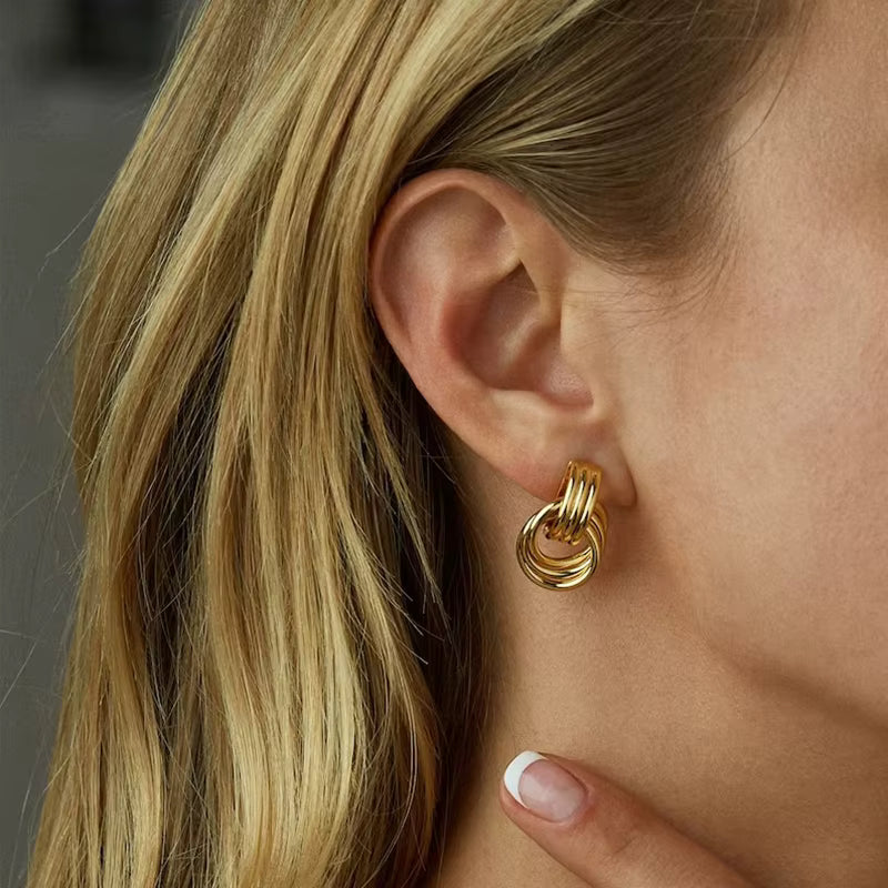 Elara Gold Twist Earrings